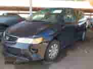 2003 Honda Odyssey LX with VIN 5FNRL18523B030840, listed as a IAAI auction lot 42832979 with 206,434 mi miles and . Bid and sale history available at DreamBid. Image 2.