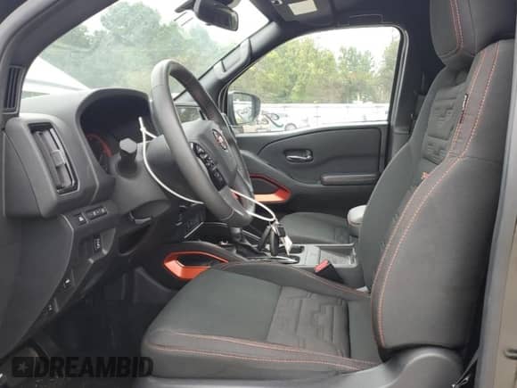 2025 Nissan Frontier Pro-4X with VIN 1N6ED1EK7SN612127, listed as a Copart auction lot 80576445 with 11,489 mi miles and Salvage title. Bid and sale history available at DreamBid. Image 7.