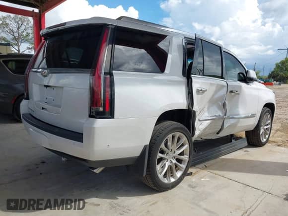 2018 Cadillac Escalade Premium Luxury with VIN 1GYS3CKJ0JR302807, listed as a IAAI auction lot 43403341 with 92,858 mi miles and . Bid and sale history available at DreamBid. Image 4.