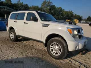 2009 Dodge Nitro SE with VIN 1D8GU28K79W511897, listed as a Copart auction lot 81119315 with 105,378 mi miles and Salvage title. Bid and sale history available at DreamBid. Image 4.