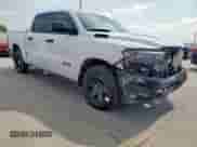 2025 Ram 1500 Tradesman with VIN 1C6RRFGG6SN543501, listed as a Copart auction lot 61486845 with 9,729 mi miles and Salvage title. Bid and sale history available at DreamBid. Image 4.