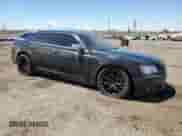 2013 Chrysler 300 C с VIN 2C3CCAET9DH523682, выставлен на аукционе Copart как лот 70926075 с пробегом 99 979 миль миль и Списание • Salvage title. История ставок и продаж доступна на DreamBid. Изображение 4.