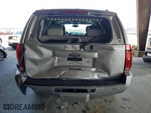 2010 Chevrolet Tahoe LTZ с VIN 1GNUKCE06AR290528, выставлен на аукционе Copart как лот 67053115 с пробегом 183 190 миль миль и Списание • Salvage title. История ставок и продаж доступна на DreamBid. Изображение 6.