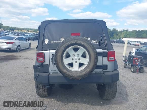 2013 Jeep Wrangler Sport with VIN 1C4AJWAG4DL661597, listed as a IAAI auction lot 43133496 with 80,714 mi miles and . Bid and sale history available at DreamBid. Image 16.