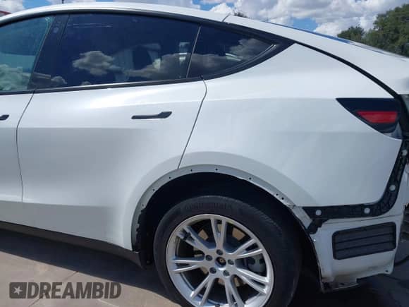 2023 Tesla Model Y Long Range with VIN 7SAYGDEE6PA078790, listed as a IAAI auction lot 43261075 with 20,370 mi miles and . Bid and sale history available at DreamBid. Image 23.