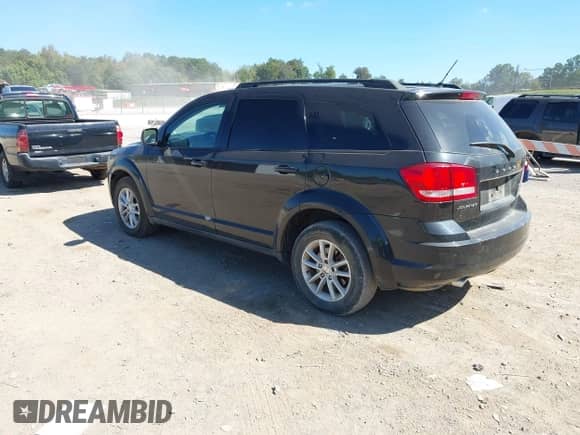2013 Dodge Journey SXT with VIN 3C4PDCBG5DT571121, listed as a IAAI auction lot 43321535 with 123,096 mi miles and . Bid and sale history available at DreamBid. Image 3.