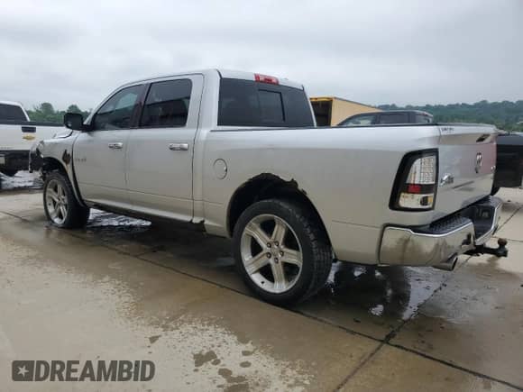2009 Dodge 1500 SLT with VIN 1D3HV13T39S726069, listed as a Copart auction lot 59736435 with 198,486 mi miles and Salvage title. Bid and sale history available at DreamBid. Image 2.