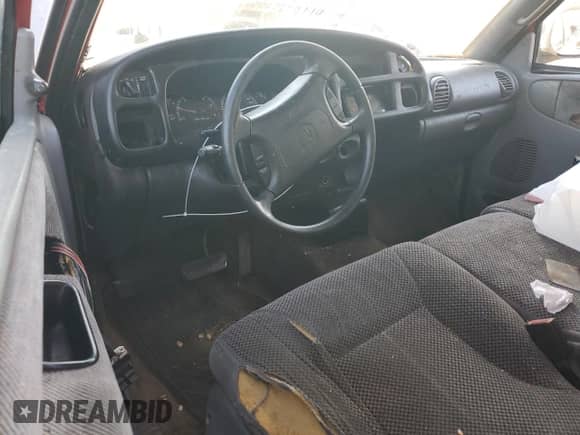 1999 Dodge 1500 z VIN 3B7HC12Y4XG177384, wystawiony jako Copart lot #80792125 z przebiegiem 136 578 mil mil oraz Szkoda całkowita • Salvage title. Historia ofert i sprzedaży dostępna na DreamBid. Obrazek 8.