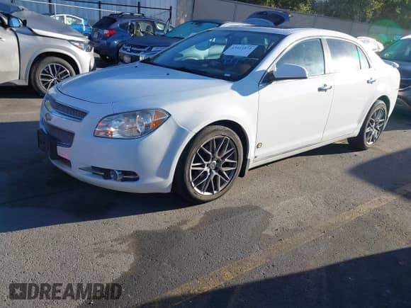 2009 Chevrolet Malibu LTZ with VIN 1G1ZK57749F131338, listed as a IAAI auction lot 43411871 with 135,544 mi miles and . Bid and sale history available at DreamBid. Image 2.