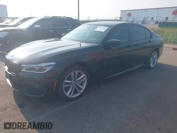 2017 BMW 7 Series ALPINA B7 xDrive with VIN WBA7F2C55HG421227, listed as a IAAI auction lot 42811801 with 96,969 mi miles and . Bid and sale history available at DreamBid. Image 17.