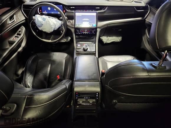 2023 Jeep Grand Cherokee Limited with VIN 1C4RJKBG8P8709880, listed as a Copart auction lot 70421855 with 36,993 mi miles and Salvage title. Bid and sale history available at DreamBid. Image 8.