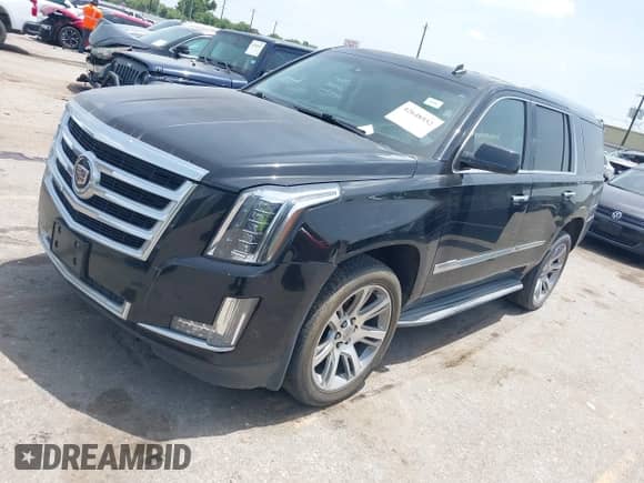 2015 Cadillac Escalade Luxury with VIN 1GYS3BKJ6FR187602, listed as a IAAI auction lot 42648552 with 164,759 mi miles and . Bid and sale history available at DreamBid. Image 17.