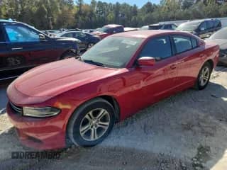 2015 Dodge Charger SE with VIN 2C3CDXBG7FH770886, listed as a Copart auction lot 82556135 with 253,654 mi miles and Clean title. Bid and sale history available at DreamBid. Image 1.