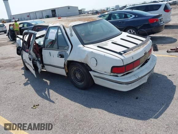 1993 Chevrolet Lumina z VIN 2G1WL54T9P1145239, wystawiony jako IAAI lot #42925111 z przebiegiem 228 767 mil mil oraz . Historia ofert i sprzedaży dostępna na DreamBid. Obrazek 3.