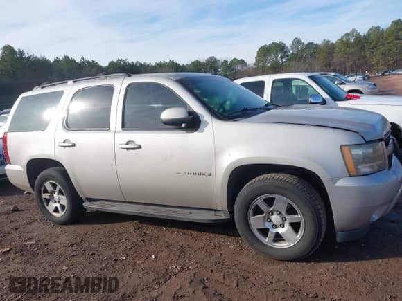 2009 Chevrolet Tahoe 1LT z VIN 1GNEC23329R242741, wystawiony jako IAAI lot #41280594 z przebiegiem 255 674 mil mil oraz . Historia ofert i sprzedaży dostępna na DreamBid. Obrazek 13.