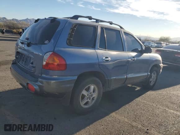2001 Hyundai Santa Fe GLS z VIN KM8SC83D11U129013, wystawiony jako Copart lot #78885494 z przebiegiem 168 175 mil mil oraz Szkoda całkowita • Salvage title. Historia ofert i sprzedaży dostępna na DreamBid. Obrazek 3.