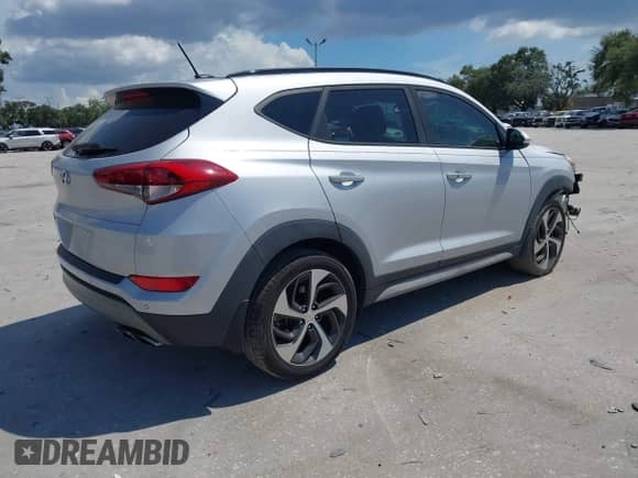 2017 Hyundai Tucson Sport with VIN KM8J33A21HU575334, listed as a IAAI auction lot 42951968 with 89,991 mi miles and . Bid and sale history available at DreamBid. Image 4.