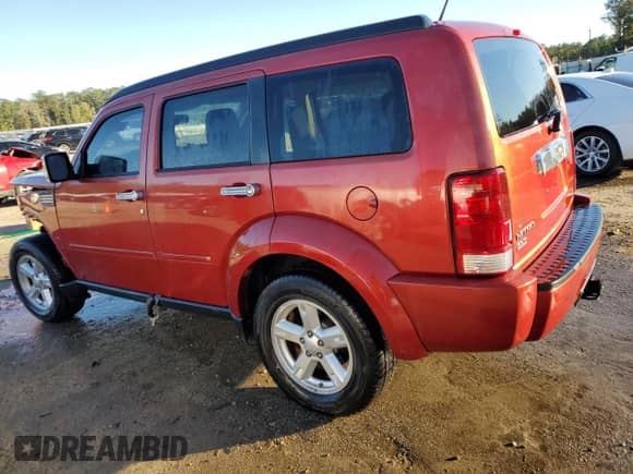2008 Dodge Nitro SLT with VIN 1D8GT58K78W165658, listed as a Copart auction lot 80871404 with 247,538 mi miles and Salvage title. Bid and sale history available at DreamBid. Image 2.