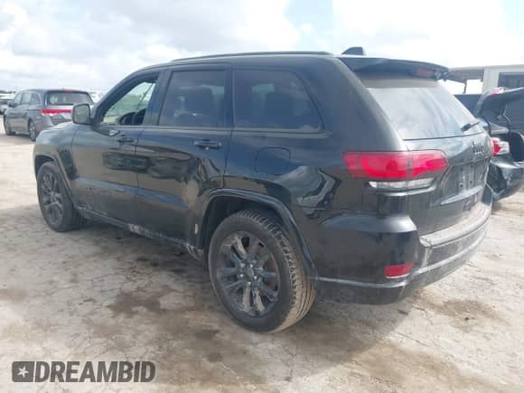 2020 Jeep Grand Cherokee Altitude with VIN 1C4RJEAG2LC355395, listed as a IAAI auction lot 42679925 with 86,025 mi miles and . Bid and sale history available at DreamBid. Image 3.
