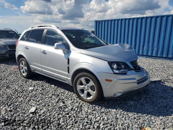 2015 Chevrolet Captiva Sport LT with VIN 3GNAL3EK8FS519362, listed as a Copart auction lot 84267945 with 49,912 mi miles and Salvage title. Bid and sale history available at DreamBid. Image 4.