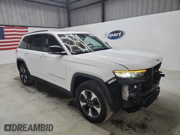 2024 Jeep Grand Cherokee with VIN 1C4RJYB69RC129743, listed as a Copart auction lot 87460235 with 56,990 mi miles and Clean title. Bid and sale history available at DreamBid. Image 4.