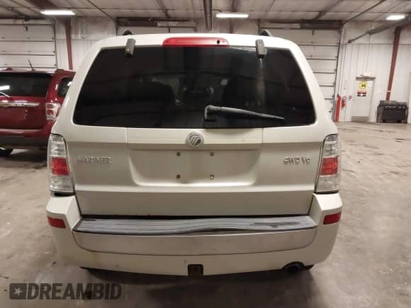 2008 Mercury Mariner with VIN 4M2CU91148KJ42603, listed as a IAAI auction lot 42311239 with 173,554 mi miles and . Bid and sale history available at DreamBid. Image 17.