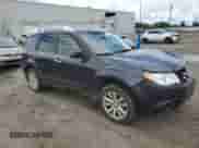 2011 Subaru Forester z VIN JF2SHBHC7BH719649, wystawiony jako Copart lot #57782065 z przebiegiem 241 157 mil mil oraz Szkoda całkowita • Salvage title. Historia ofert i sprzedaży dostępna na DreamBid. Obrazek 4.