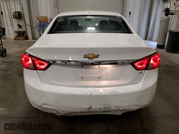2014 Chevrolet Impala LS with VIN 2G11X5SLXE9261050, listed as a Copart auction lot 70771885 with 134,671 mi miles and Salvage title. Bid and sale history available at DreamBid. Image 6.