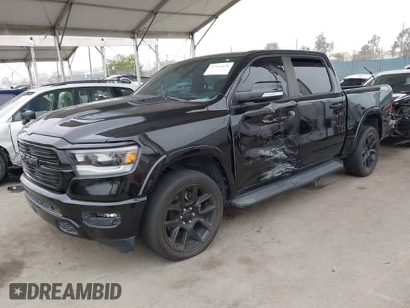 2021 Ram 1500 Laramie z VIN 1C6SRFJT9MN542322, wystawiony jako IAAI lot #42455038 z przebiegiem 68 601 mil mil oraz . Historia ofert i sprzedaży dostępna na DreamBid. Obrazek 2.