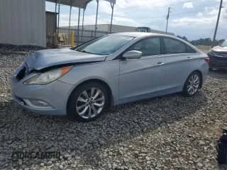 2012 Hyundai Sonata SE с VIN 5NPEC4AC1CH452690, выставлен на аукционе Copart как лот 82149805 с пробегом 226 272 миль миль и Списание • Salvage title. История ставок и продаж доступна на DreamBid. Изображение 1.