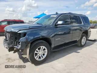 2019 Chevrolet Tahoe LS z VIN 1GNSKAKCXKR370099, wystawiony jako Copart lot #85596785 z przebiegiem 83 535 mil mil oraz Szkoda całkowita • Salvage title. Historia ofert i sprzedaży dostępna na DreamBid. Obrazek 1.