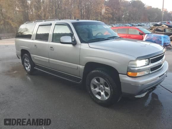 2005 Chevrolet Suburban LS with VIN 3GNFK16Z75G127872, listed as a Copart auction lot 77887864 with 201,471 mi miles and Salvage title. Bid and sale history available at DreamBid. Image 4.