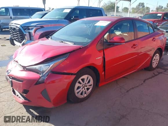 2016 Toyota Prius Two z VIN JTDKBRFUXG3510060, wystawiony jako IAAI lot #43337169 z przebiegiem 107 365 mil mil oraz . Historia ofert i sprzedaży dostępna na DreamBid. Obrazek 2.