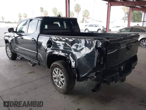 2025 Toyota Tacoma SR5 with VIN 3TMKB5FN8SM037803, listed as a IAAI auction lot 43120493 with Not provided miles and . Bid and sale history available at DreamBid. Image 3.