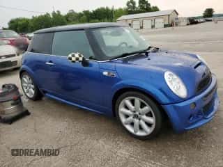 2005 MINI Hardtop S with VIN WMWRE33555TG96166, listed as a Copart auction lot 58917425 with 87,344 mi miles and Salvage title. Bid and sale history available at DreamBid. Image 4.