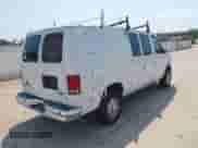 2014 Ford Econoline Cargo Commercial с VIN 1FTNE2EW2EDA68140, выставлен на аукционе IAAI как лот 42890189 с пробегом 196 072 миль миль и . История ставок и продаж доступна на DreamBid. Изображение 4.