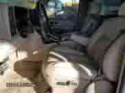 2003 Chevrolet Suburban LT z VIN 3GNFK16Z33G218425, wystawiony jako Copart lot #81138144 z przebiegiem 246 985 mil mil oraz Szkoda całkowita • Salvage title. Historia ofert i sprzedaży dostępna na DreamBid. Obrazek 7.