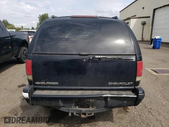 1996 Chevrolet Blazer with VIN 1GNDT13WXT2316813, listed as a Copart auction lot 72022235 with 230,579 mi miles and Salvage title. Bid and sale history available at DreamBid. Image 6.