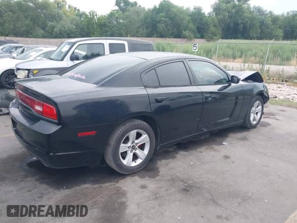 2012 Dodge Charger SE with VIN 2C3CDXBG2CH137983, listed as a IAAI auction lot 42769041 with 128,239 mi miles and . Bid and sale history available at DreamBid. Image 4.