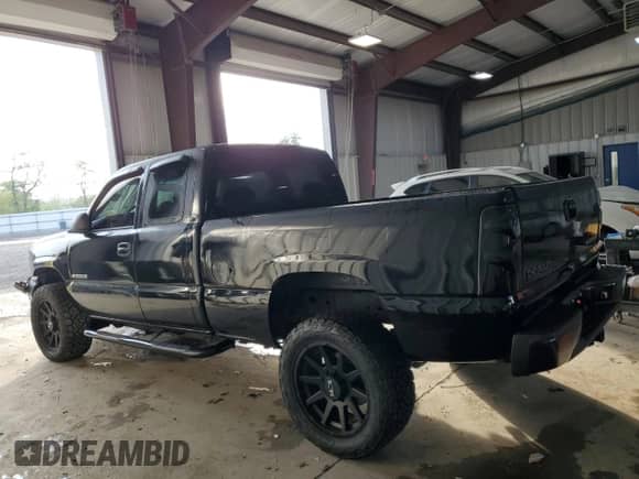 2004 Chevrolet Silverado 2500HD Work Truck with VIN 1GCHK29U54E237977, listed as a Copart auction lot 84549995 with 150,988 mi miles and Salvage title. Bid and sale history available at DreamBid. Image 2.