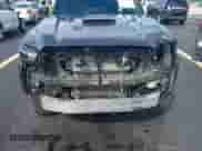 2024 Toyota Tacoma SR5 z VIN 3TYKB5FN6RT007410, wystawiony jako IAAI lot #43205199 z przebiegiem 26 768 mil mil oraz . Historia ofert i sprzedaży dostępna na DreamBid. Obrazek 13.