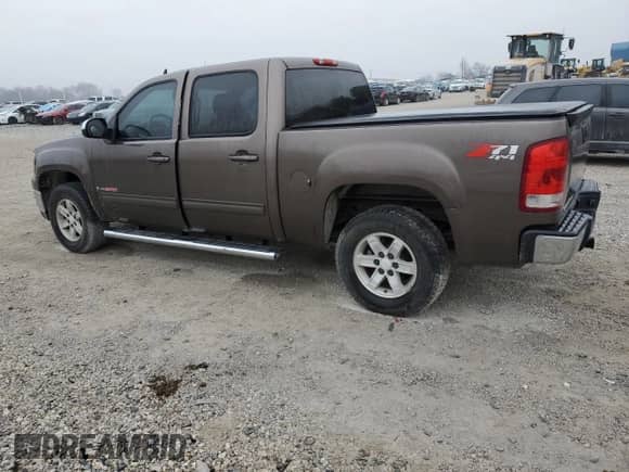 2007 GMC Sierra 1500 z VIN 2GTEK13Y671661974, wystawiony jako Copart lot #43061085 z przebiegiem 193 085 mil mil oraz Czysty tytuł • Clean title. Historia ofert i sprzedaży dostępna na DreamBid. Obrazek 2.