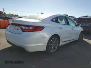 2015 Hyundai Azera z VIN KMHFG4JG2FA450191, wystawiony jako Copart lot #87260645 z przebiegiem 149 666 mil mil oraz Czysty tytuł • Clean title. Historia ofert i sprzedaży dostępna na DreamBid. Obrazek 3.