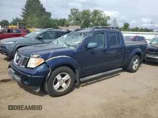 2007 Nissan Frontier SE with VIN 1N6AD09U67C407812, listed as a Copart auction lot 82100195 with 166,096 mi miles and Salvage title. Bid and sale history available at DreamBid. Image 1.