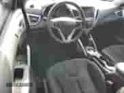 2012 Hyundai Veloster w/Black Int z VIN KMHTC6AD1CU081088, wystawiony jako Copart lot #71685565 z przebiegiem Nie podano mil oraz Szkoda całkowita • Salvage title. Historia ofert i sprzedaży dostępna na DreamBid. Obrazek 8.