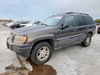 2004 Jeep Grand Cherokee Laredo with VIN 1J4GW48S84C361744, listed as a Copart auction lot 91091115 with 236,095 mi miles and Clean title. Bid and sale history available at DreamBid. Image 1.