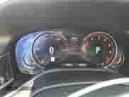 2018 BMW 7 Series 750i with VIN WBA7F0C5XJGM23968, listed as a Copart auction lot 71518115 with 64,569 mi miles and Salvage title. Bid and sale history available at DreamBid. Image 9.