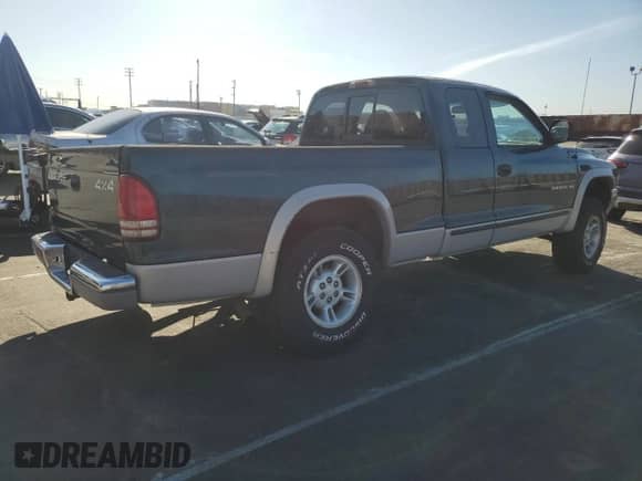 1997 Dodge Dakota with VIN 1B7GG23Y8VS303577, listed as a Copart auction lot 48778865 with 189,316 mi miles and Salvage title. Bid and sale history available at DreamBid. Image 3.