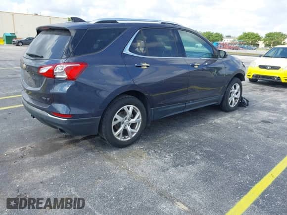 2019 Chevrolet Equinox LT with VIN 3GNAXLEX4KL243380, listed as a IAAI auction lot 42139882 with 71,925 mi miles and . Bid and sale history available at DreamBid. Image 4.