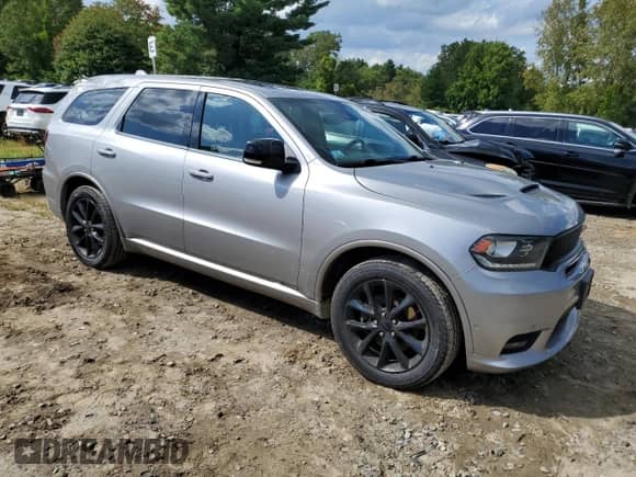 2018 Dodge Durango R/T with VIN 1C4SDJCT0JC383785, listed as a Copart auction lot 71398285 with 112,044 mi miles and Salvage title. Bid and sale history available at DreamBid. Image 4.